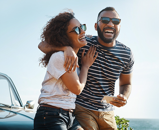 Happy couple enjoying life after successful SMILE surgery at Goel Vision.