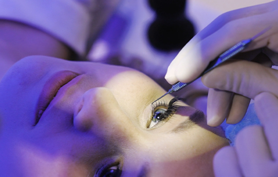 Doctor performing SMILE eye surgery on patient at Goel Vision.