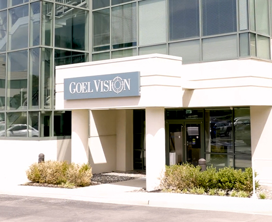 Exterior view of a Goel Vision clinic with the Goel Vision sign visible, showcasing the modern building and inviting entrance