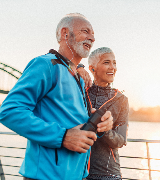 Couple enjoying outdoor walk with clarity thanks to RxSight Light Adjustable Lens (LAL) technology