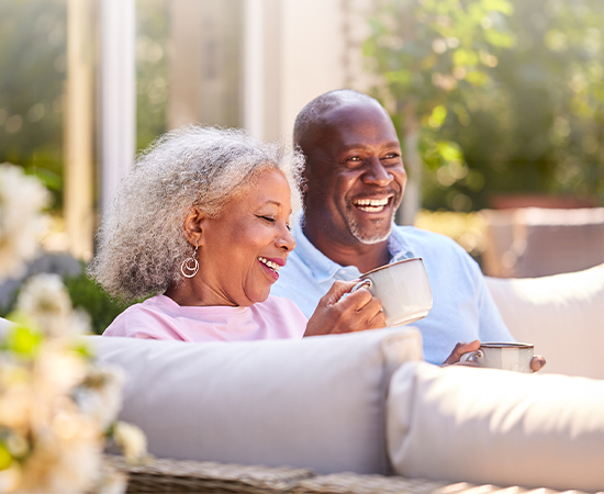 Happy elderly couple enjoying their daily activities after successful cataract surgery.