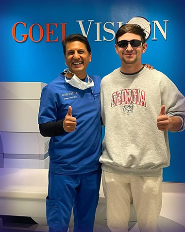 Dr. Sonny Goel with a happy patient after their LASIK surgery at Goel Vision, showcasing successful outcomes.