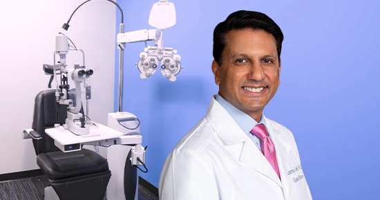 Dr. Sonny Goel standing next to an eye examination machine, introducing Goel Vision’s educational video series about LASIK.