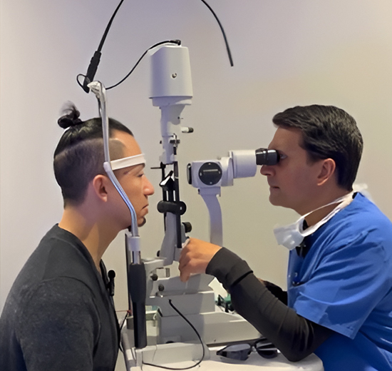 Dr. Goel with a patient, ready to perform PRK eye surgery.